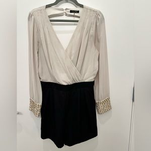 DEPRI Beige and black V neck long sleeve romper size L